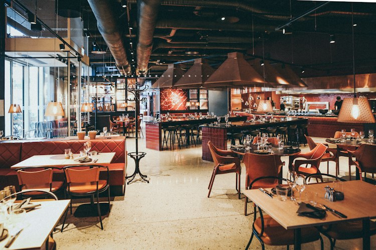 Restaurant interior with professionally arranged tables